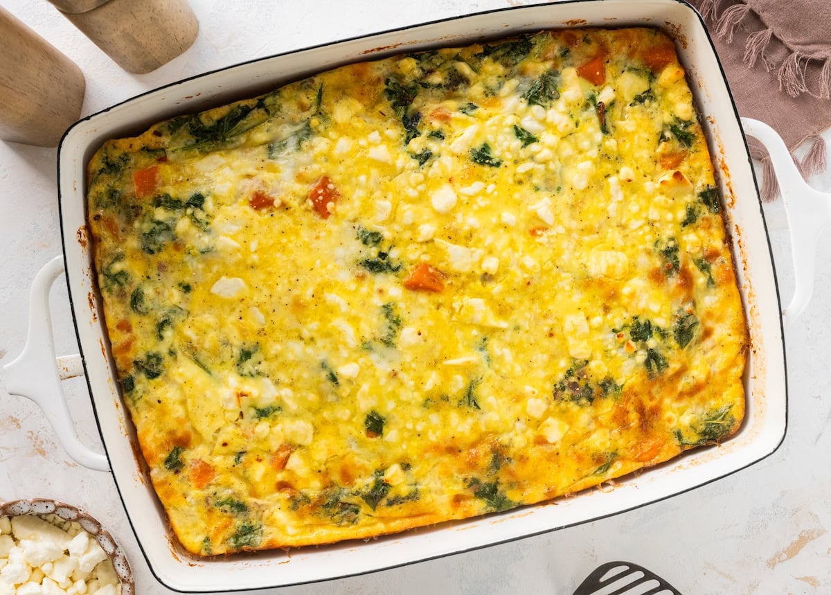 sweet potato kale breakfast casserole with feta in baking dish.